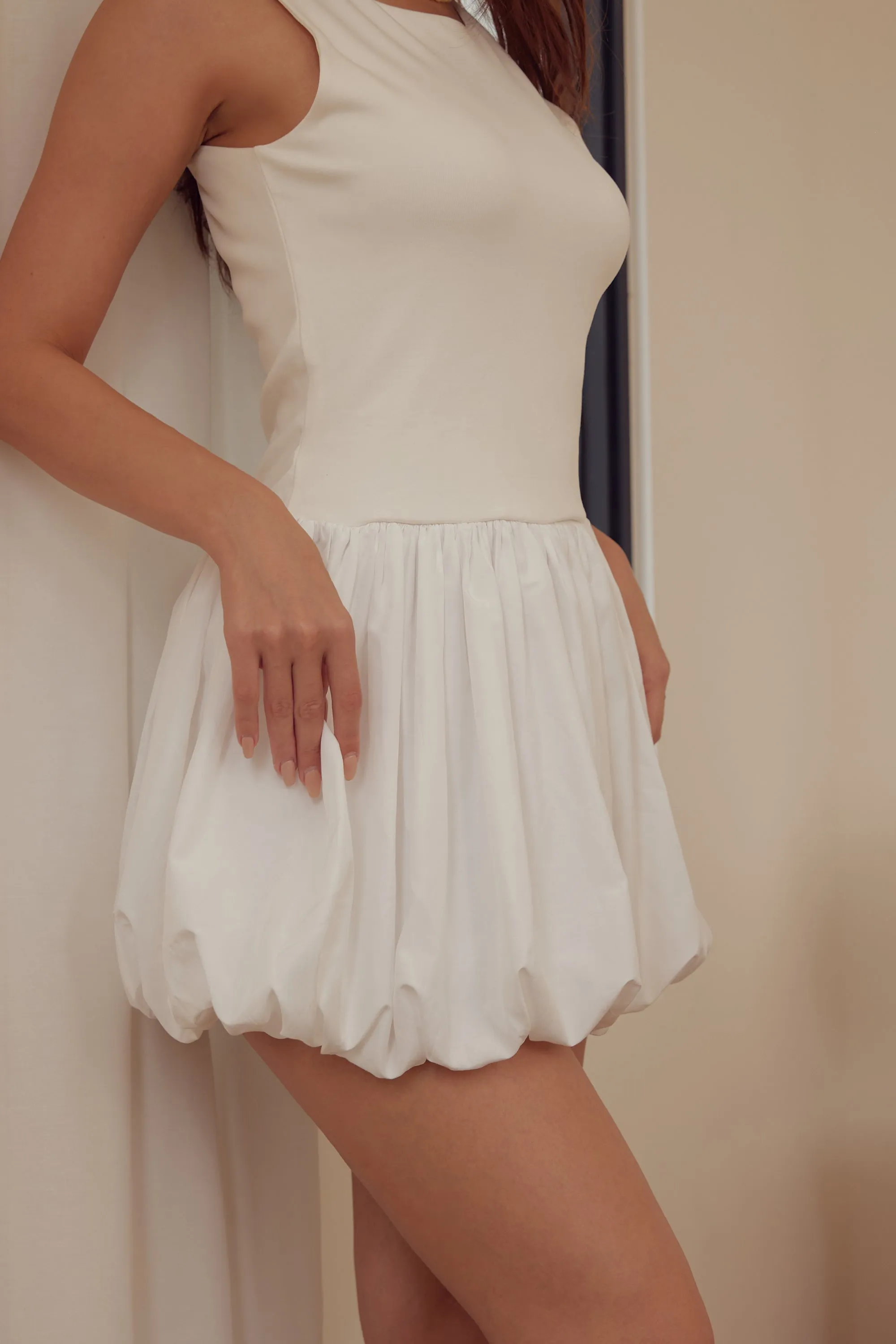 A little tipsy bubble dress in white